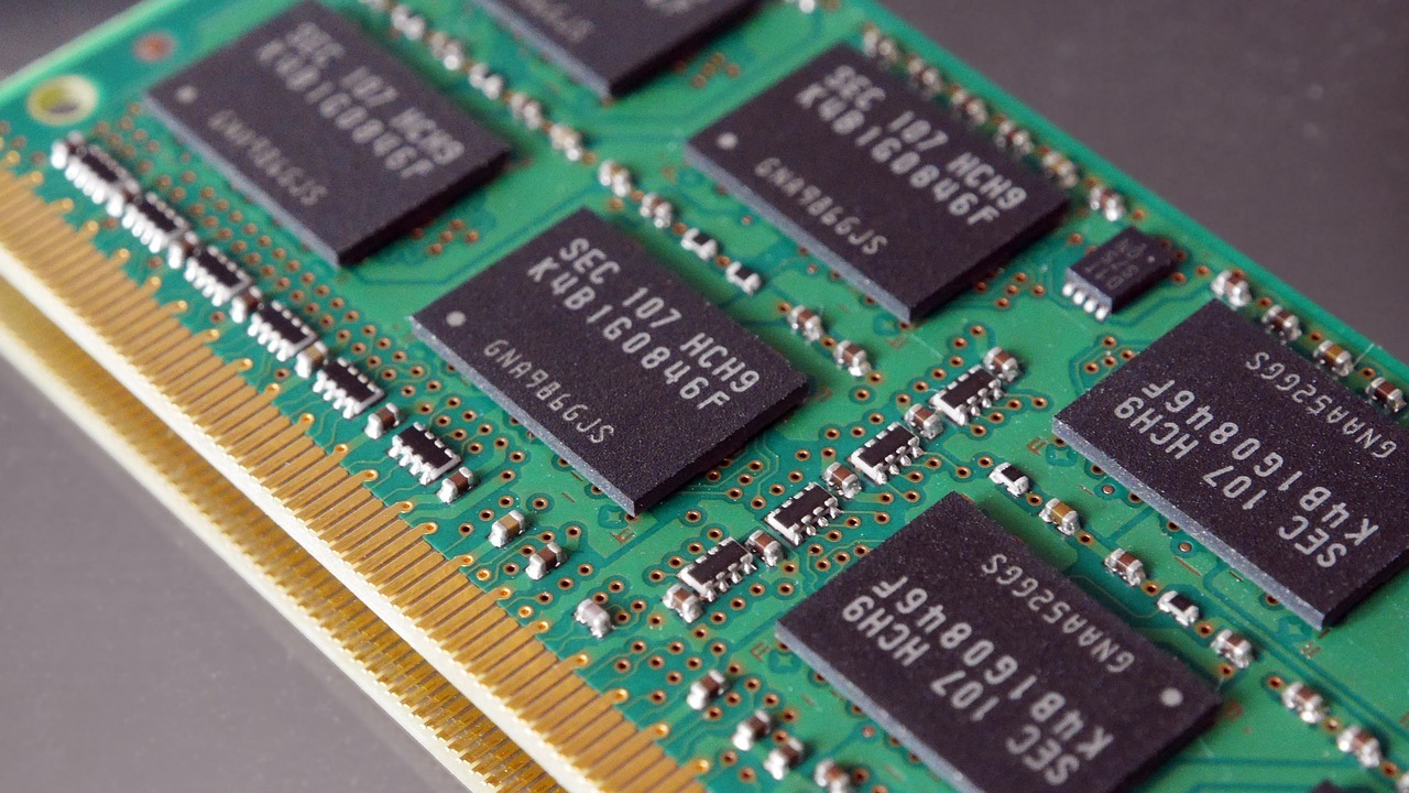 Two computer memory modules or chips stacked atop each other, like memory blocks.